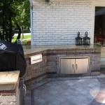 Outdoor Kitchen Area with Granite Countertop